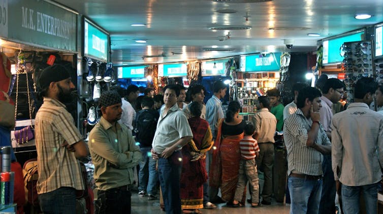 People in an indoor market.