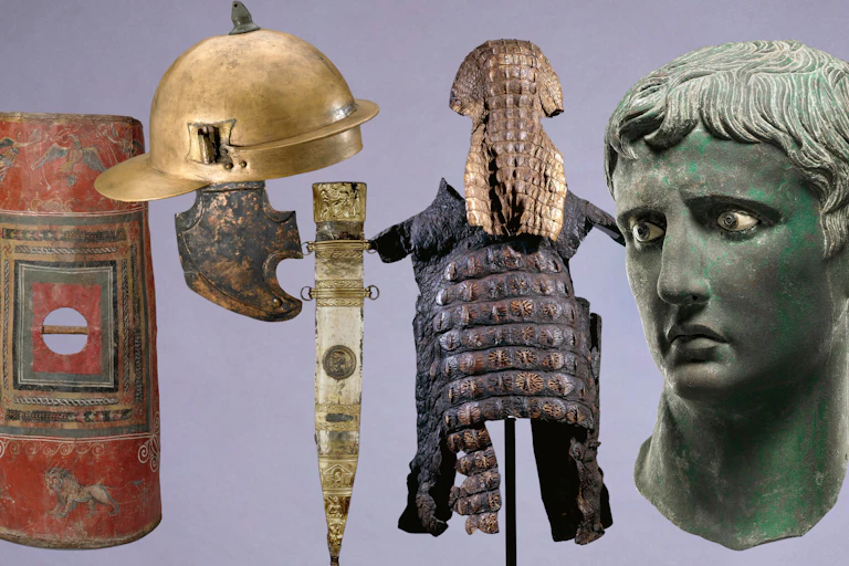 (Left to right) A Roman shield, a copper alloy Roman legionary helmet, an iron sword with gilded bronze scabbard, a suit of parade armour made from crocodile skin and a bronze head depicting the first Roman emperor, Augustus.