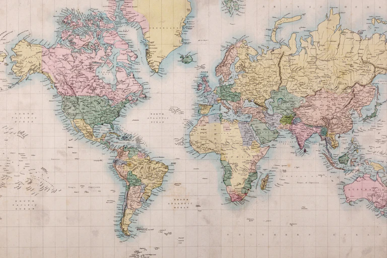 A very old faded map of the world.