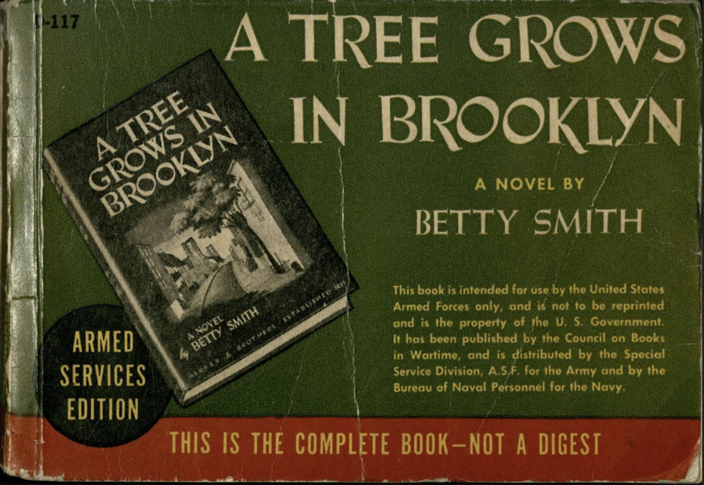 Green horizontal copy of 'A Tree Grows in Brooklyn' with creases along the cover.
