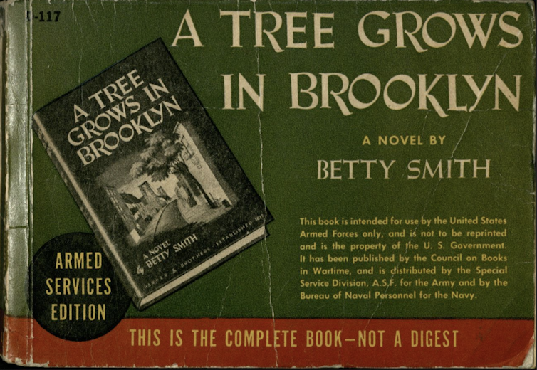 Green horizontal copy of 'A Tree Grows in Brooklyn' with creases along the cover.