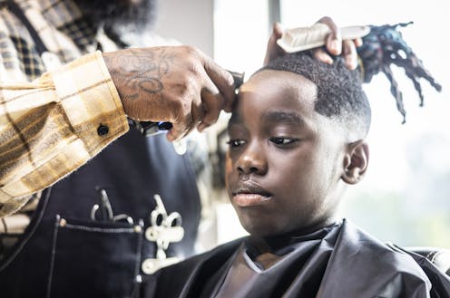A Texas court ruling on a Black student wearing hair in long locs reflects history of racism in schools