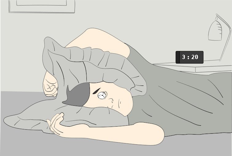 Illustration of sleep-deprived man in bed, covering his head with pillows.