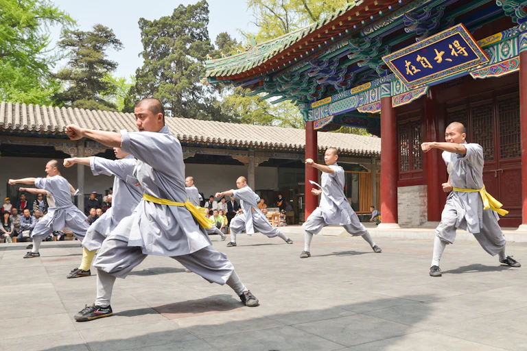 Shaolin monks demonstrating a kung fu form