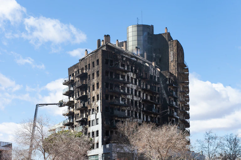 Ongoing rescue operation by firefighters burned residential buildings in Valencia, Spain - 23 February 2024.