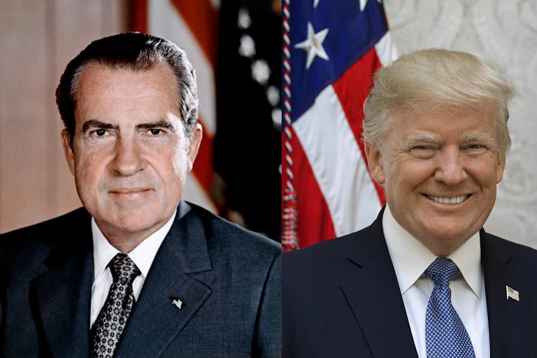 Two men in coats and ties.