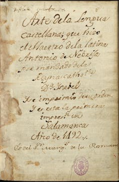 Yellowed manuscript with written text inscribed in ink down the page