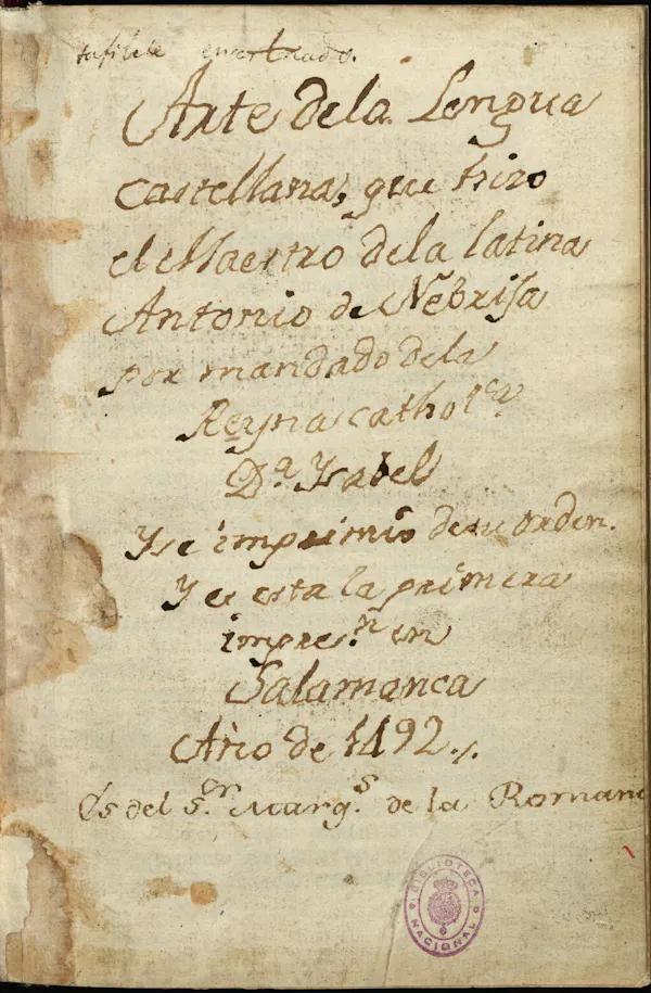 Manuscrito amarillento con texto escrito inscrito con tinta en la página