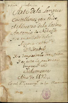 Yellowed manuscript with written text inscribed in ink down the page