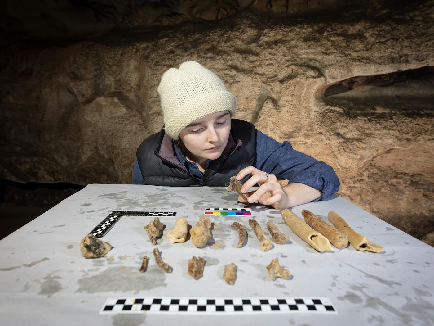 Dr Meg M Walker inspecting fossils in Engelbrechts Cave.