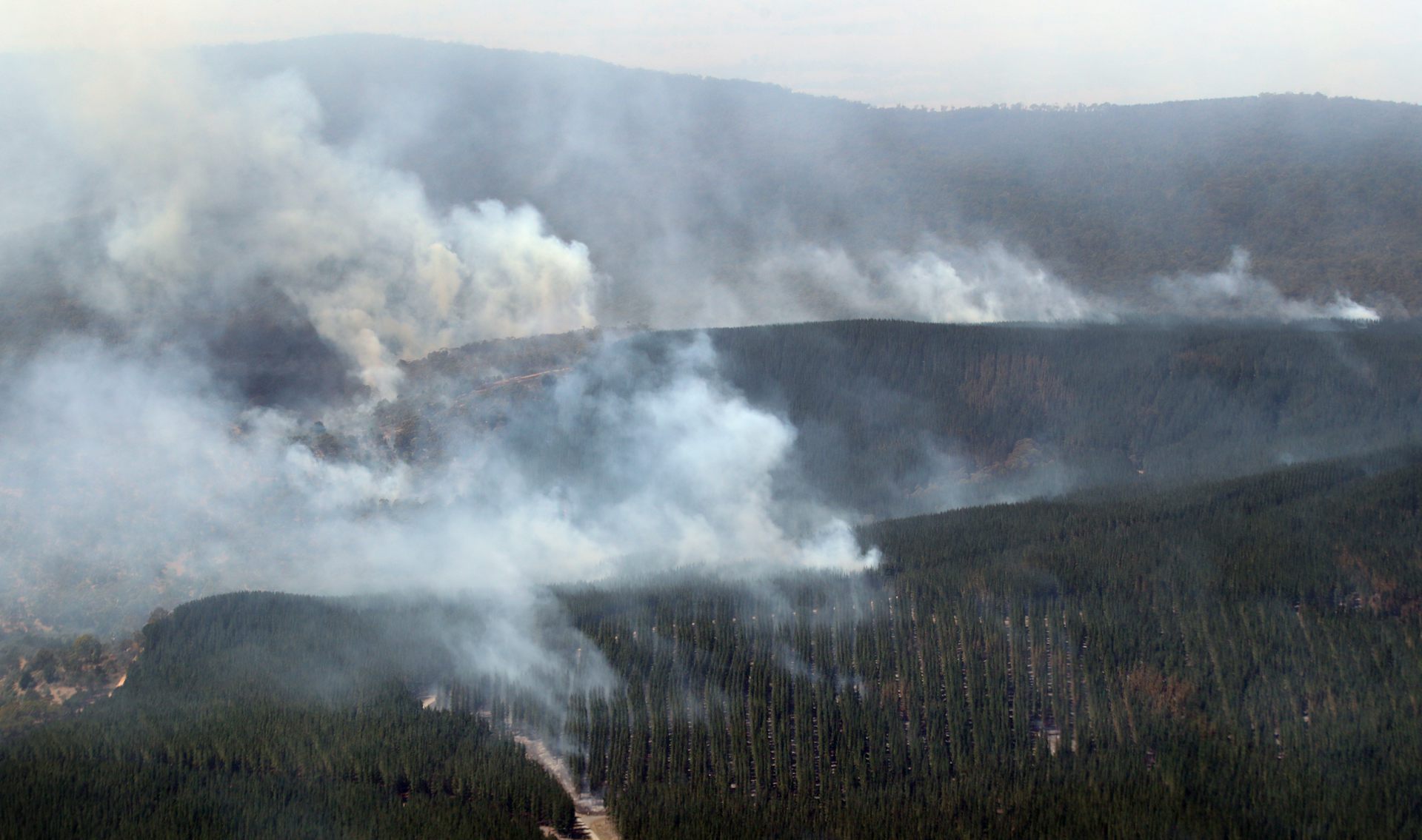 smoke in hilly landscape