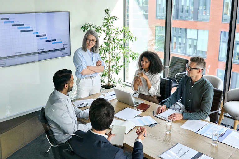 woman leading a meeting in an office