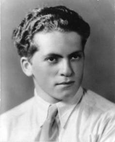 Black and white portrait of a young man with wavy hair