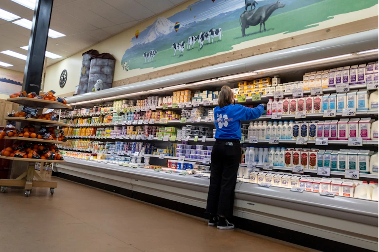 person working in a grocery store