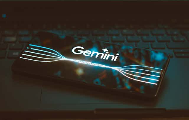 a mobile phone screen with the Gemini wordmark