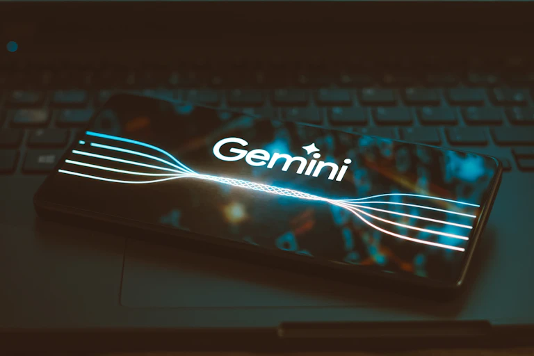 a mobile phone screen with the Gemini wordmark