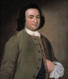 Un hombre vestido formalmente del siglo XVIII.