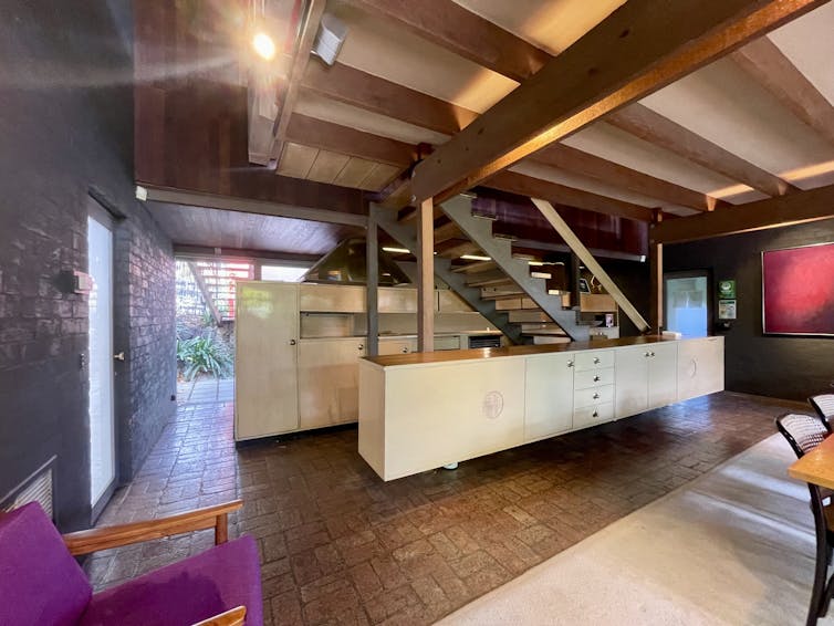 The kitchen and living room.