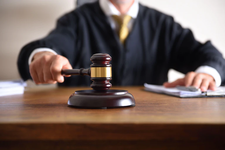 A judge striking a gavel