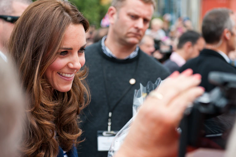 Kate Middleton greeting the public in a 2014 photo.