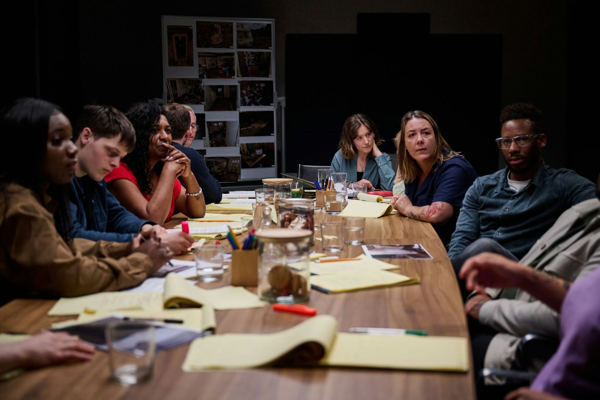 The Channel 4 jury deliberates round a table