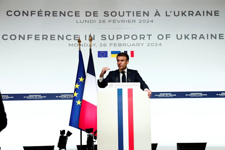 French president Emmanuel Macron gestures as he makes a speech at a conference in support of Ukraine, February 2024.