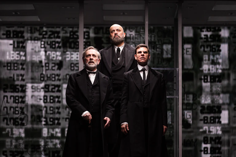 Three men in black suits
