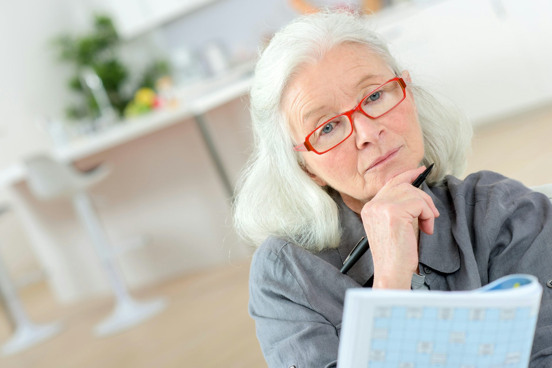 A woman doing puzzles.