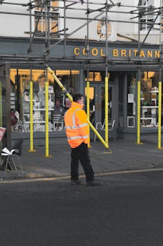 Workman by some scaffolding