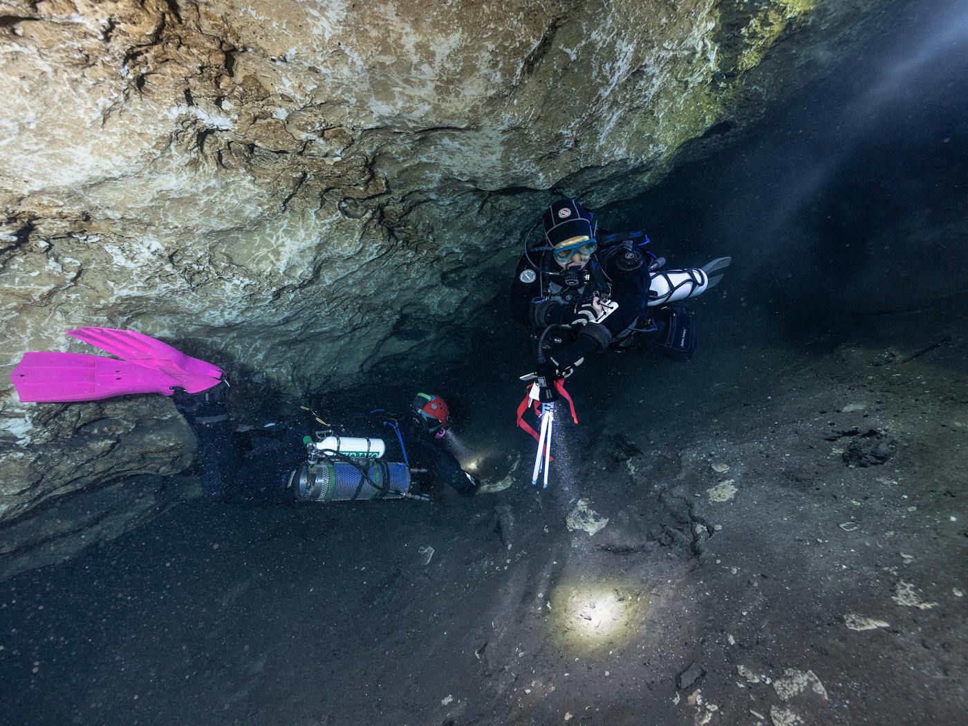 Divers in Fossil Cave searching for fossils