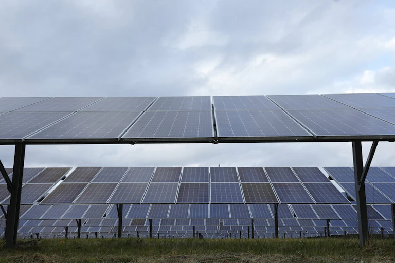 Rows of solar panels stand in Detroit, Michigan.