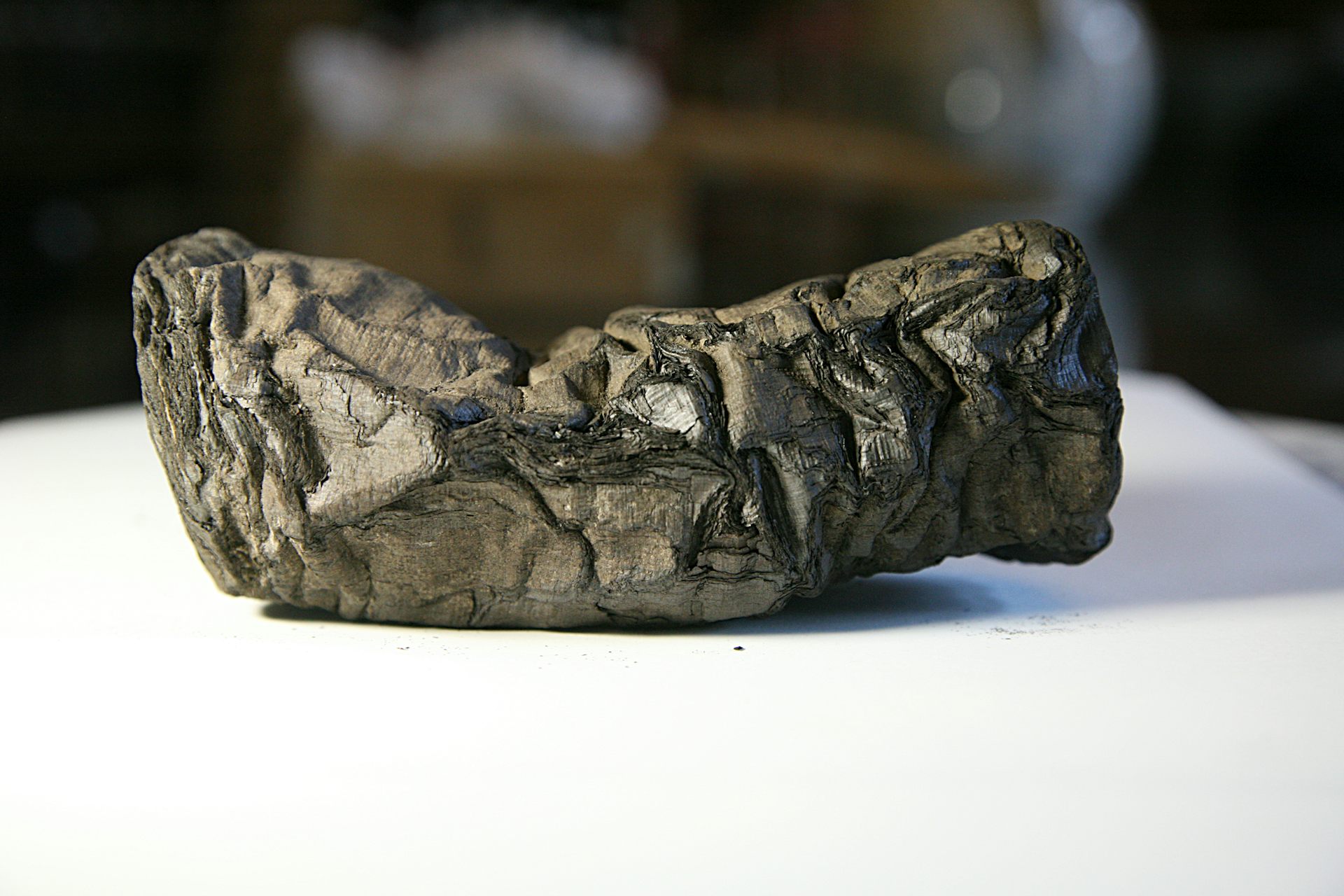 A bulky grey object lies horizontal.