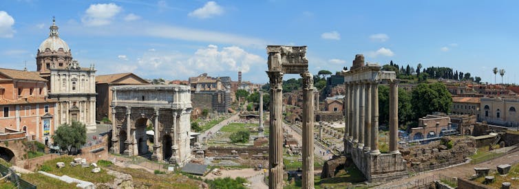 Panoramic view of ancient Roman columns and buildings
