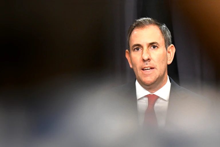 Photo of Treasruer Jim Chalmers at news conference