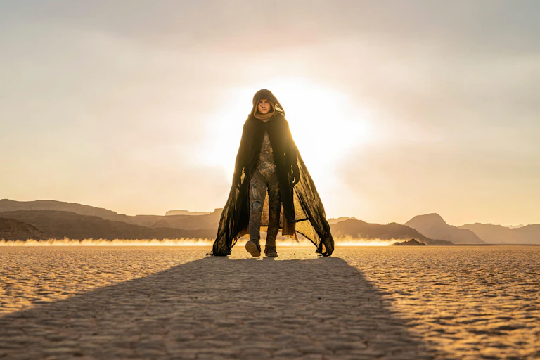 Man walks through desert