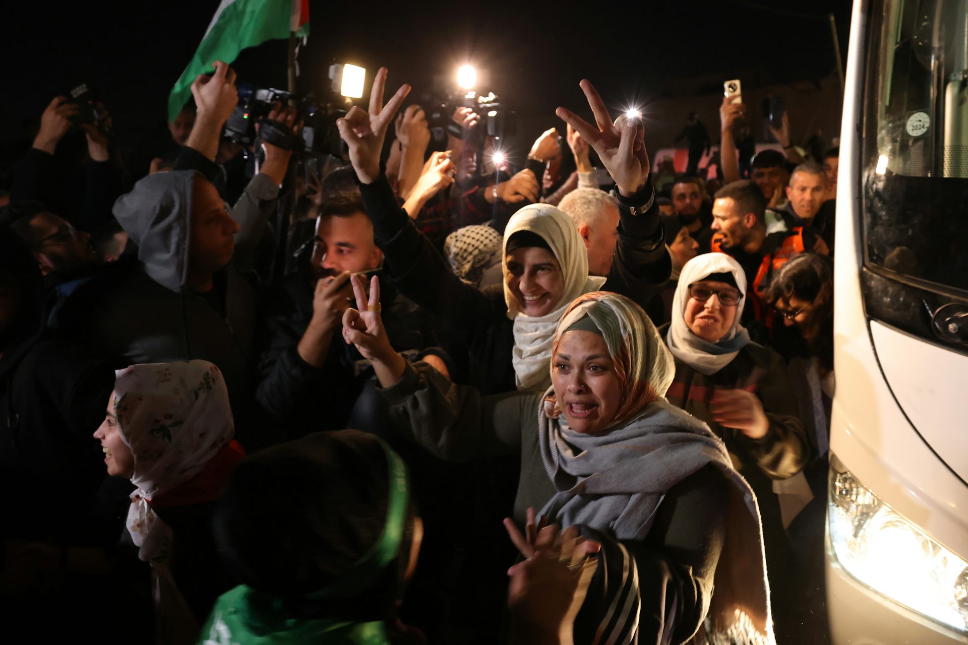 Palestinians in Gaza greeting family and friends being released from Israeli custody, November 2023.