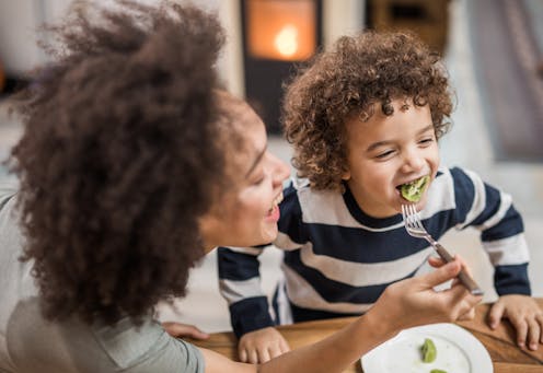 Helping children eat healthier foods may begin with getting parents to do the same, research suggests