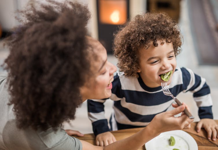 Helping children eat healthier foods may begin with getting parents to do the same, research suggests