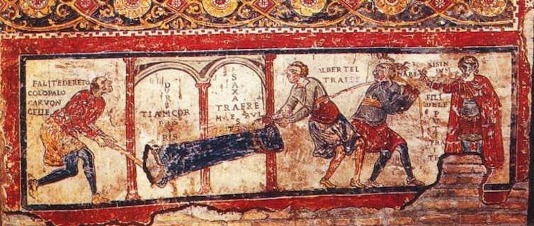 Inscription de saint Clément, détail d’une fresque de la fin du XIᵉ siècle dans la basilique souterraine de San Clemente à Rome