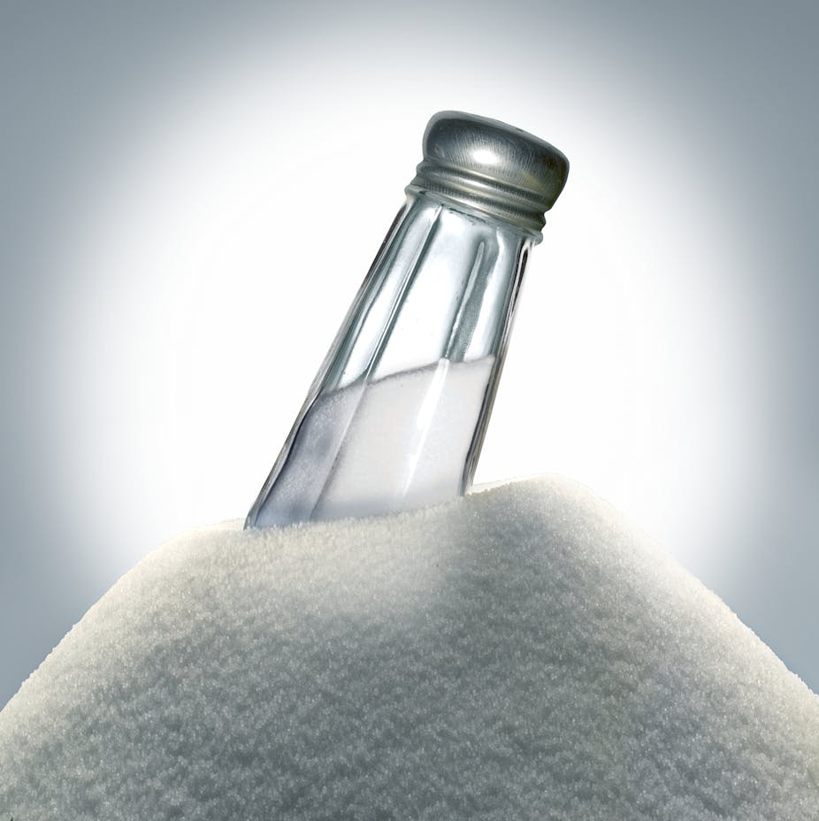 Salt shaker embedded in a large pile of salt