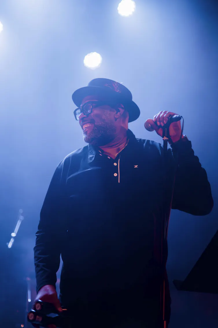 A man at a microphone.