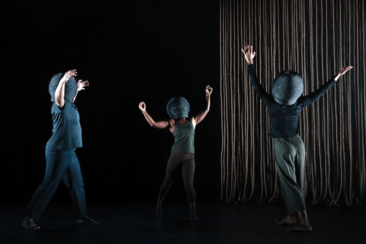 Production image: three dancers