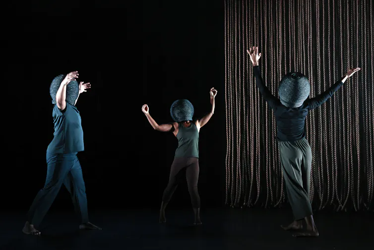 Production image: three dancers