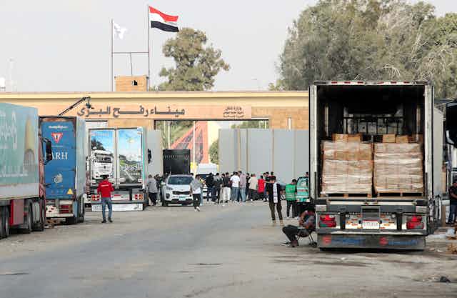 Aid trucks waiting outside the Rafah Crossing from Egypt to Gaza.