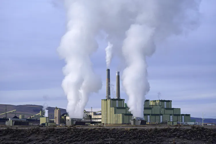 Steam billows from a coal-fired power plant.