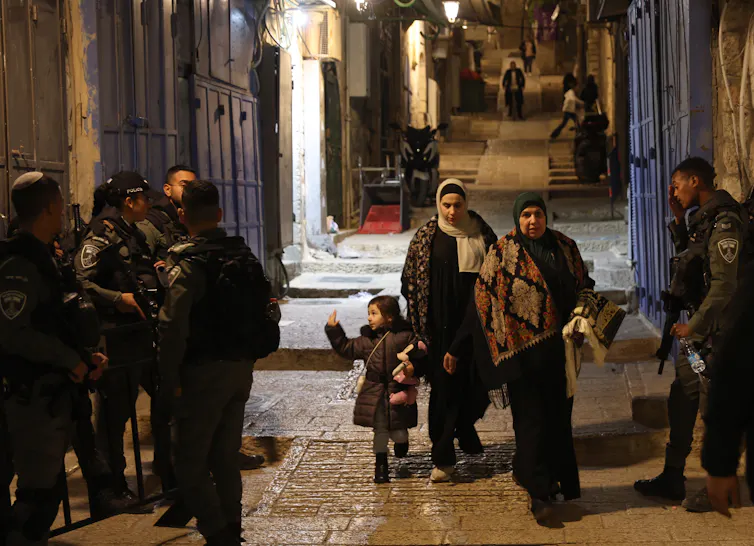 Israeli border forces patrol Jerusalem's Old City as Ramadan gets underway on the West Bank, March 11 2024.
