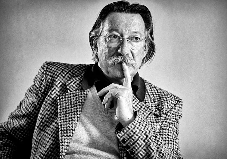 ELIZA's creator, Professor Joseph Weizenbaum in a black and white photograph.