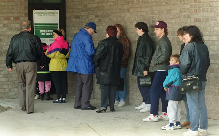 People line up at a polling station.