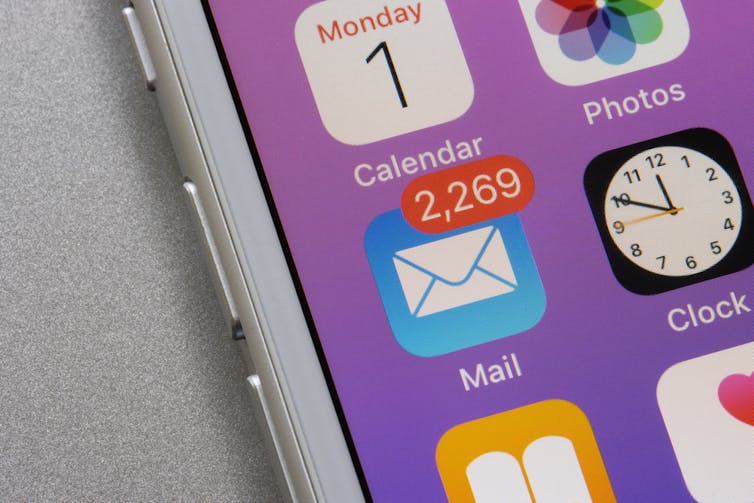 A phone screen showing an email app icon with a 2269 unread emails badge.