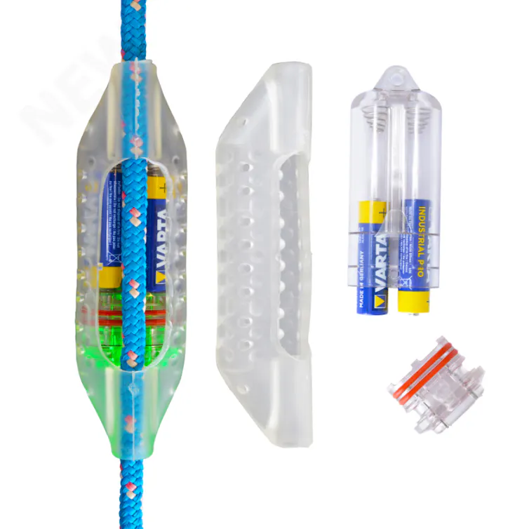 white background, shot of the white equipment that attaches to a net, with batteries.